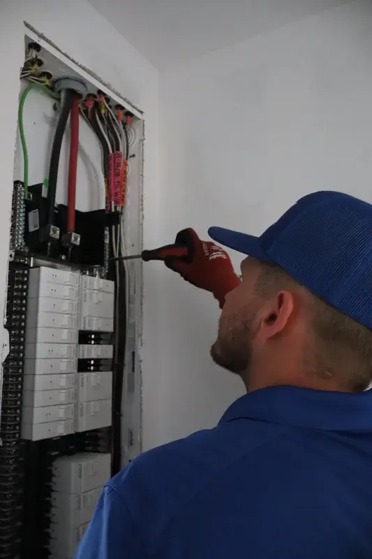 Rack Air technician wiring a heating system in DeLand FL